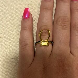 loki gold and green ring